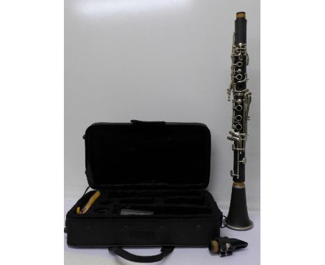 A Lindo cased clarinet