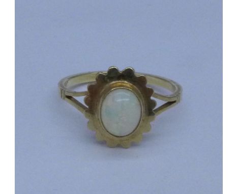 A 9ct gold and opal ring, 1.6g, N