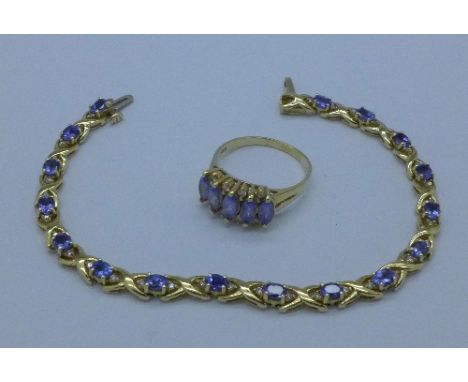 A 14ct gold, tanzanite and diamond bracelet with matching ring, total weight 13.2g, R