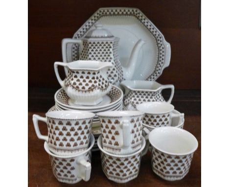 An Adams six setting coffee service comprising six cups, saucers, side plates, cake plate, teapot, two creams and sugar, suga