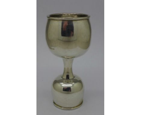 A sterling silver shot measure
