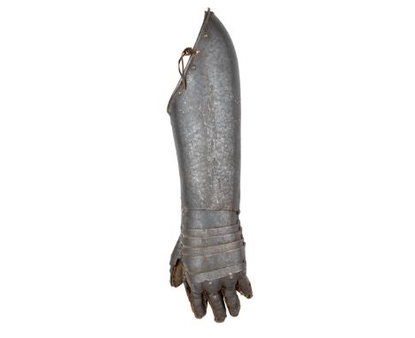 A GERMAN GAUNTLET FOR THE LEFT HAND, EARLY 16TH CENTURYformed of a long tubular cuff shaped to the point of the elbow and fit