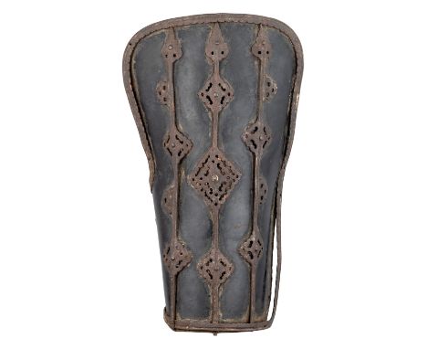 Ⓜ A RARE IRON-MOUNTED LACQUERED LEATHER FOREARM DEFENCE, PROBABLY TIBET 15TH-16TH CENTURYformed of an L-shaped leather panel 