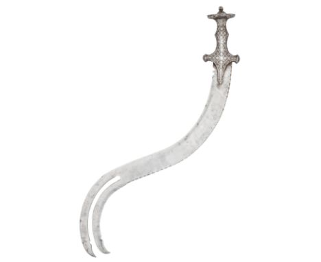 ‡ Ⓜ AN UNUSUAL INDIAN OR NEPALESE SHORTSWORD, 19TH CENTURYwith recurved s-shaped blade of wootz steel, formed with a bifurcat