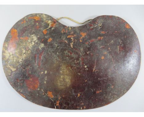 Ⓜ A RARE TIBETAN FLANCHARD FOR A HORSE (SGA~I AM COG), 15TH/17TH CENTURYof kidney-shaped form, the inner face with two iron w