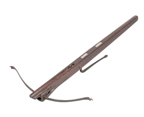 A CROSSBOW IN ENGLISH EARLY 17TH CENTURY STYLE, 2OTH CENTURY; with slender steel bow retained by a pair of irons (string miss