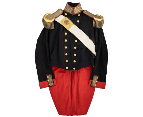 A GEORGIAN OFFICER~S COATEE OF THE ROYAL ARTILLERYA fine double-breasted blue coatee of the 1828 Pattern, with scarlet collar