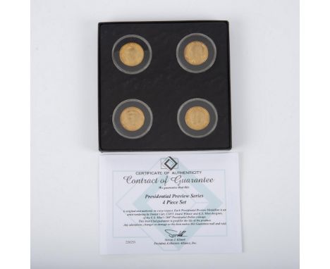 A set of 4 Denver Mint coinage. Each coin depicts on the obverse side a US President's portrait; George Washington, John Adam