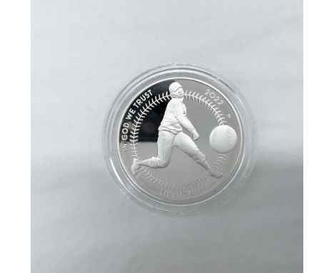 Philadelphia Mint. The obverse side depicts a pitcher in mid-throw with a baseball in the foreground. The reverse side shows 