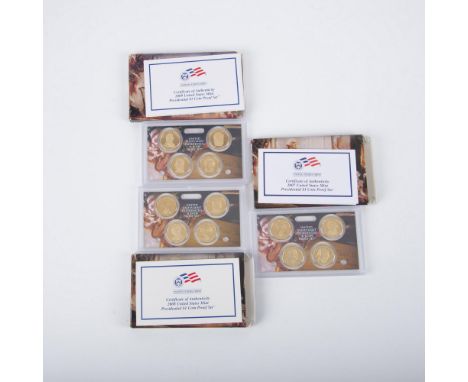 A set of 3 US Mint, each containing 4 Presidential Dollar Coins Proof. The 2007 set includes George Washington, John Adams, T
