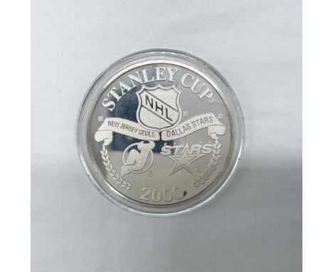 Limited edition. One Troy Ounce .999 Fine Silver, Silver Series NHL Medallion. The piece is in a protective case. The case is