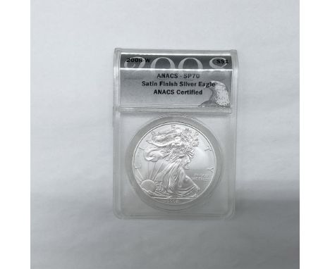Satin Finish. West Point Mint. The obverse side depicts full length figure of Liberty in stride draped in the folds of the fl