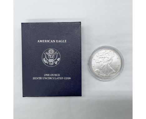 1 ounce. West Point Mint. The obverse side depicts full length figure of Liberty in stride draped in the folds of the flag. S