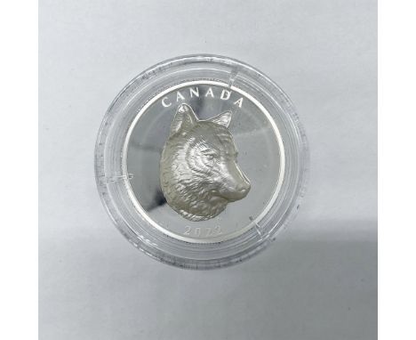 The obverse side depicts the profile of Queen Elizabeth II over a leaf motif pattern. The reverse features a finely sculpted 