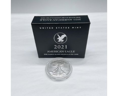 1 ounce. West Point Mint. The obverse side depicts full length figure of Liberty in stride draped in the folds of the flag. S