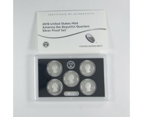 A set of 5 Silver Proof Quarters. San Francisco Mint. The obverse side features a profile of George Washington. The reverse s