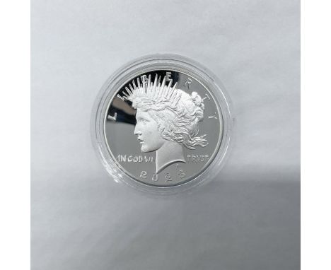 Anniversary Coin, San Francisco Mint. The obverse side features Liberty in profile with a radiant crown. The reverse side dep