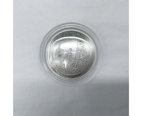 Uncirculated Silver Dollar. Philadelphia Mint. The obverse side features a footprint on the moon surface, and the reverse sid