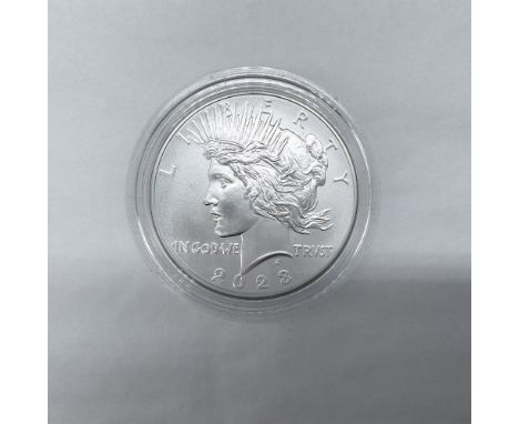 Anniversary Coin, Philadelphia Mint. The obverse side features Liberty in profile with a radiant crown. The reverse side depi
