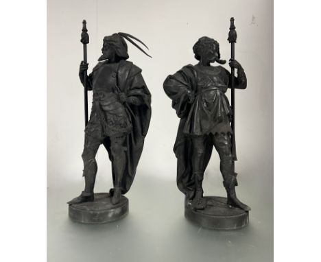 A pair of 19th century spelter figures of Scottish characters, possibly based on Sir Walter Scott's books, complete with chai