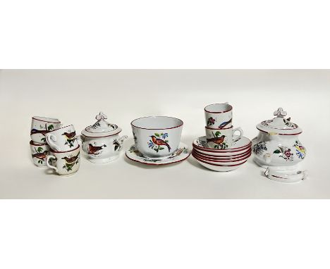 A Staffordshire part tea service with enamel painted birds comprising, six teacups, a lidded sugar basin with twin handles, a