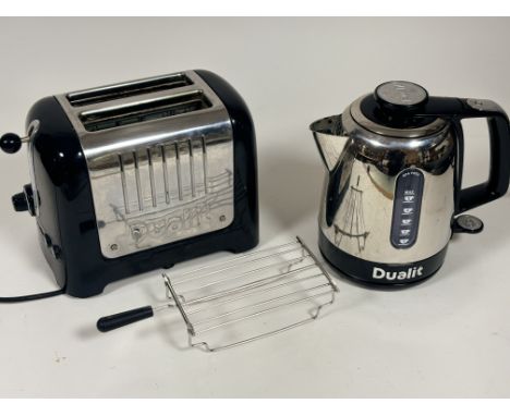 A Dualit Lite two slice black and silver toaster with warming rack together with a Dualit Domus kettle, both untested. (3)