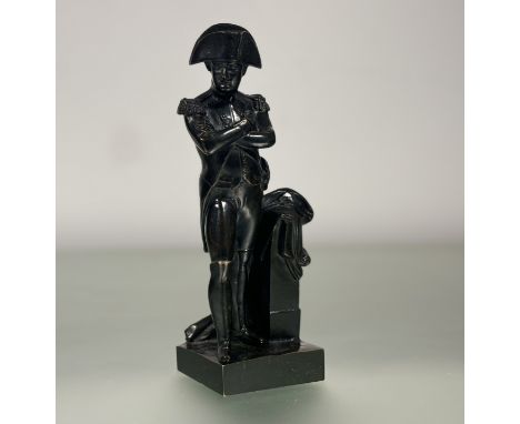 A late 19th/early 20th century bronze figure depicting Napoleon Bonaparte, with pillar, on square base, unmarked, possibly Fr