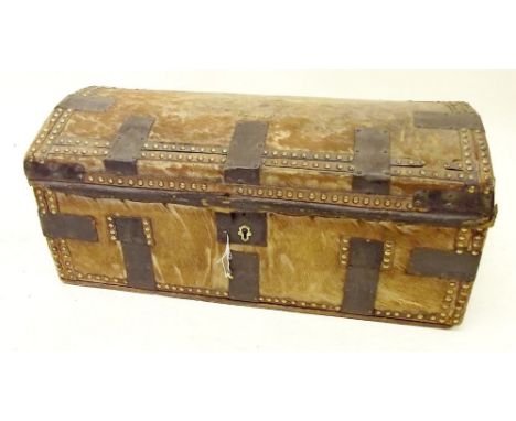 An antique small wooden trunk with hide covering and metal mounts - 69cm wide 