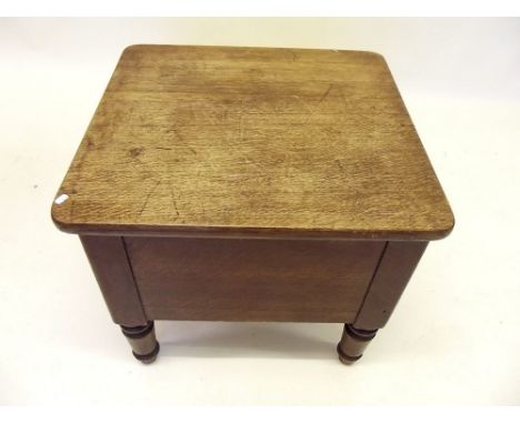 A Victorian oak commode with liner 