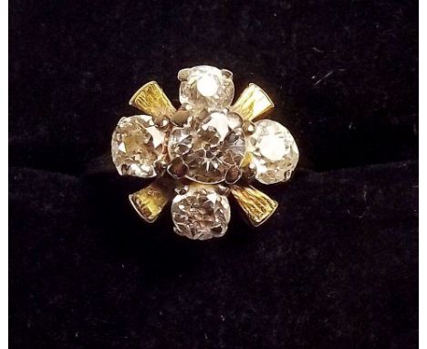 A gold and diamond floral cluster ring, central stone approx. 3/4 carat