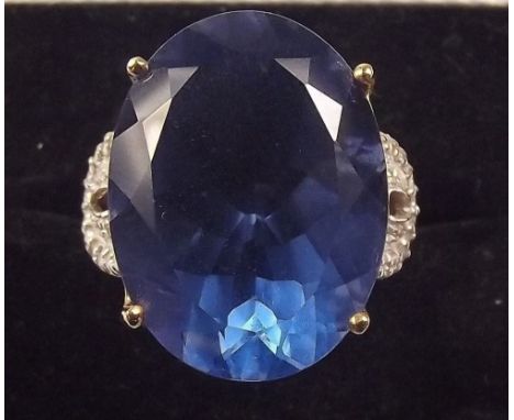 A colour change fluorite ring set in gold 