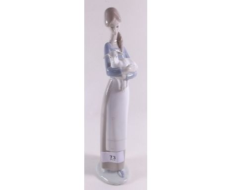 A large Lladro figure - girl carrying a lamb, 25cm