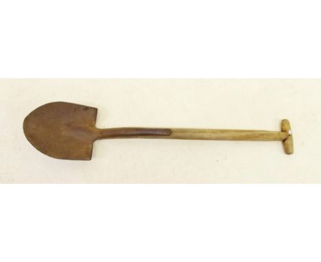 A WWII trenching shovel with 1943 ordnance arrow, marked T.Black 