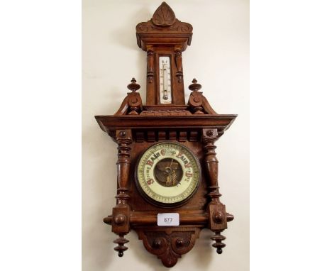 A Victorian carved barometer/thermometer