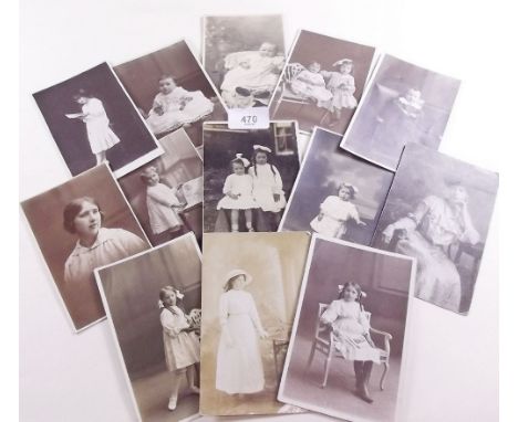A group of early portrait postcards, mainly children and babies 