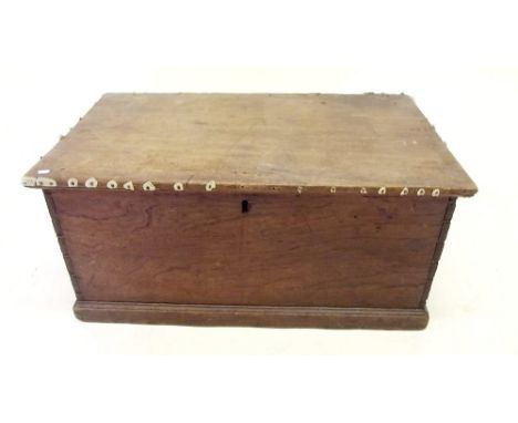 A Victorian small mahogany trunk