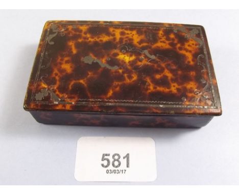 A Georgian tortoiseshell snuff box inlaid with steel  
