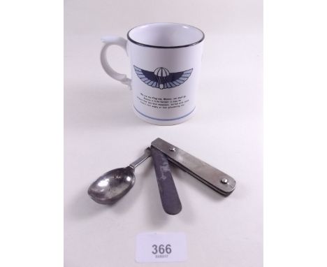 A SAS mug and an army camp folding spoon and knife 
