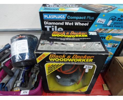A lot to include a Plasplugs diamond wet wheel tile cutter boxed, a Black &amp; Decker woodworker boxed, a Ruberoid aluminium