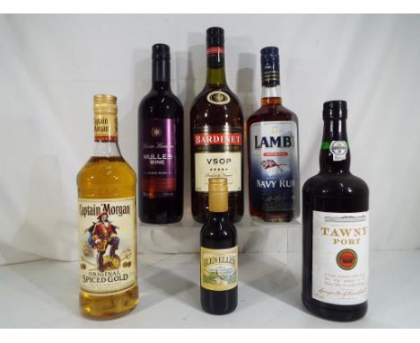 Six bottles of alcoholic beverages to include Bardinet VSOP French Brandy 100 cl, Captain Morgan spiced rum, Lamb's Navy Rum,