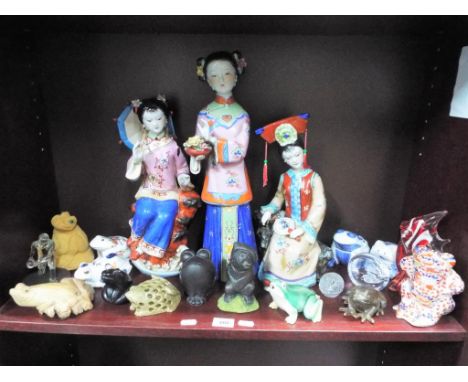 A good mixed lot to include three Asian ceramic figurines and a quantity of predominantly frog related figures to include a h