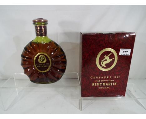 Remy Martin Fine Champagne Cognac XO 'Special', in presentation carton with certificat d'origine ca 1986 - Est £80 - £100 Thi