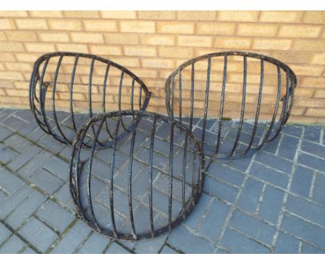 Three large iron hay racks and a set of weighing scales with graduated weights [4] - Est £40 - £60