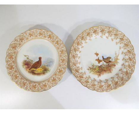 Royal Worcester - A pair of large Royal Worcester scalloped edge plates decorated with game birds, stamped to the base, appro