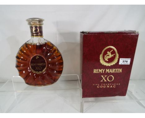 Remy Martin Fine Champagne Cognac XO 'Special', in presentation carton with certificat d'origine ca 1988 - Est £80 - £100 Thi