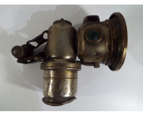 A Lucus Carbide Motorbike Lamp, 14 cm height