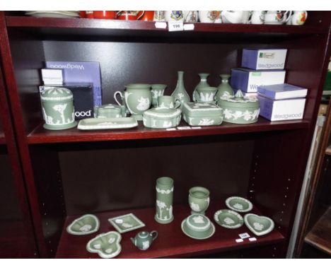 Wedgwood - a large collection of Wedgwood Jasperware, powder green to include vases, plates, lidded trinket dishes and simila