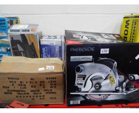 A Parkside light metal magnesium alloy saw in box, a Nutool angle grinder, boxed, a Black &amp; Decker variable speed sander,