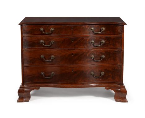 A GEORGE III MAHOGANY SERPENTINE FRONTED COMMODEIN THE MANNER OF THOMAS CHIPPENDALE, CIRCA 178083cm high, 112cm wide, 58cm de