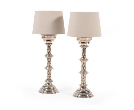 A PAIR OF SILVER PLATED METAL TABLE LAMPSIN THE GOTHIC REVIVAL STYLE, LATE 19TH/ EARLY 20TH CENTURY58cm high excluding electr